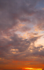 Fototapeta premium Sunset sky for background or sunrise sky and cloud at morning,Clouds and sky in the morning,Colorful morning sky and clouds backdrop,Beautiful Vivid sky painted by the sun leaving bright golden shades