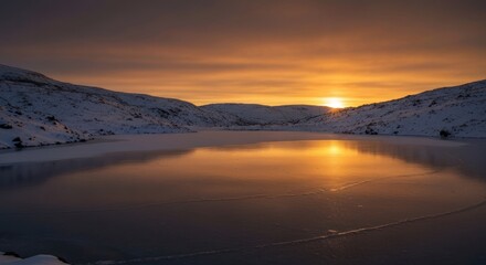 Frozen lake at sunrise, snow-capped mountains