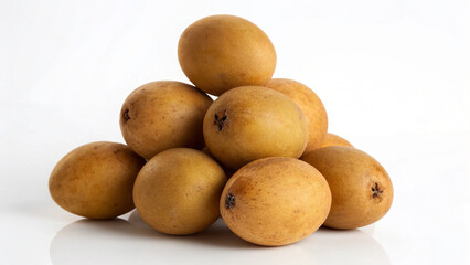 Pile of fresh sapodilla fruits isolated on white background, also known as chikoo, grown in tropical regions, a sweet and delicious treat for everyone