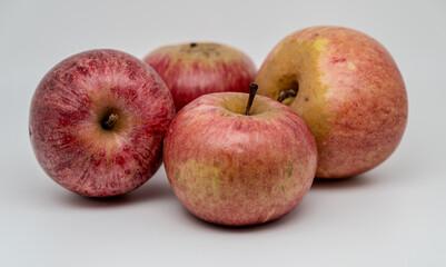A composition of a typically autumnal fruit, such as the Annurca apples from Campania, which enhances its beauty and details.
