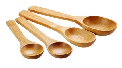 Set of four wooden cooking spoons in various sizes, showcasing natural bamboo texture, ideal for culinary tasks and kitchen decor, emphasizing eco-friendly kitchenware