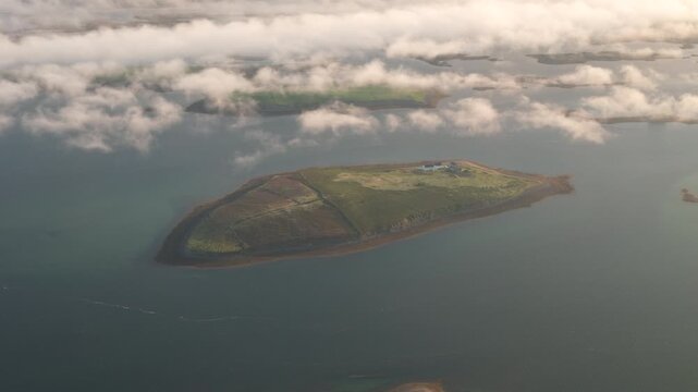 Breathtaking 4K aerial video of flying above scenic Atlantic Coast at Clew Bay with scenic coastline and islands at dawn, Murrisk, Westport, Mayo, Ireland