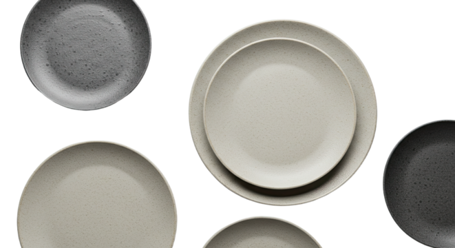 Set of ceramic plates in neutral grey, beige, and black tones with a matte finish, perfect for minimalistic kitchen or dining decor