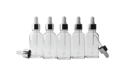 Set of five transparent glass dropper bottles with black caps on white background, ideal for cosmetics packaging or laboratory use