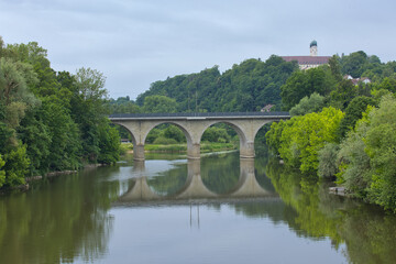 Railway bridge and the Benedictine monastery Schweiklberg over the river Vils in Vilshofen an der Donau, Germany.
