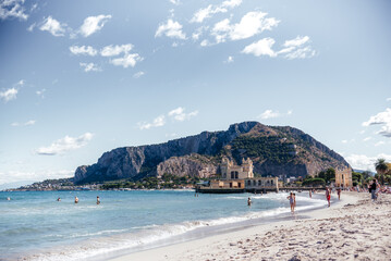 People Enjoying Mondello Beach in Sicily Autumn