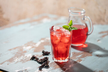 Hibiscus iced tea. Agua de Jamaica or roselle mocktail drink, summer beverage