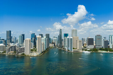 Obraz premium Drone view of Brickell skyscrapers. Brickell cityscape of downtown Miami. Panoramic Miami Brickell skyline above the coastline. Brickell Key aerial view in Miami. Landscape of Miami.