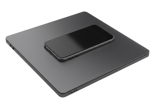 Modern technology devices, a laptop and a smartphone, rest together.