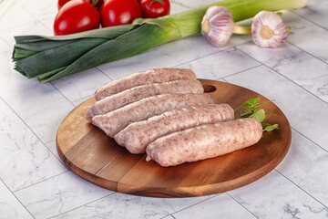 Raw pork sausages for grill