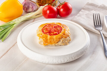 Chicken chop cutlet with cheese and tomato
