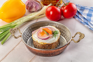 Beefsteak chop with roasted egg