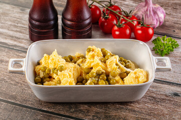 Scrambled egg omelet with green peas