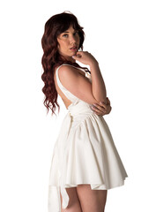 Woman posing in elegant backless white dress