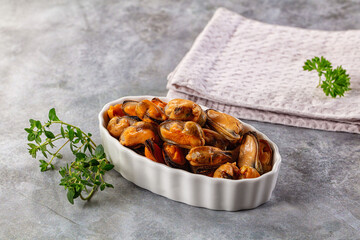 Peeled mussels heap in the bowl