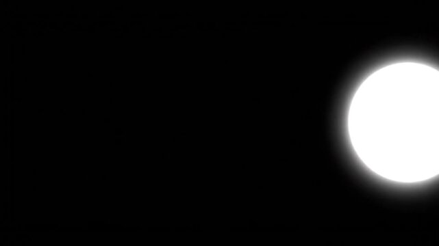 Minimalistic animation of a circle moving across a solid black background. Smooth motion with consistent speed, optional easing in and out for natural flow. Can include subtle glow or shadow