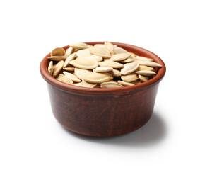 Pumpkin seeds in bowl isolated on white