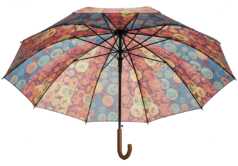 Open umbrella displays a colorful abstract pattern of circles and stripes.
