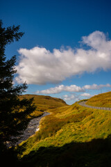 Winding Mountain Road Beside Stream in Snowdonia, Wales