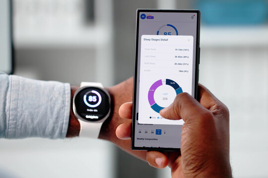 Medical Professional Using Smartwatch To Monitor Heart Rate