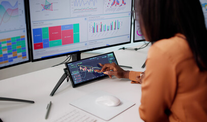 Young Executive Woman Analyzing Stock Market Data