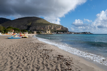 Stormy weather on seaside vacation destination, Mondello Beach, near Palermo in Sicily with fine, golden sand, turquoise waters and charming villas, South of Italy