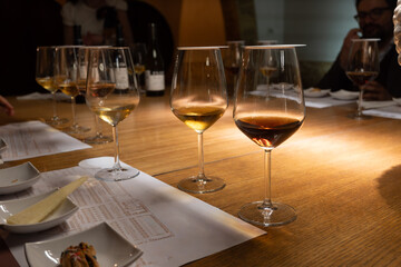 Visit of wine cellar with old large oak barrels, tasting of fortified dry or sweet tasty marsala wine in Marsala, Sicily, Italy