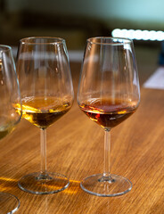 Visit of wine cellar with old large oak barrels, tasting of fortified dry or sweet tasty marsala wine in Marsala, Sicily, Italy