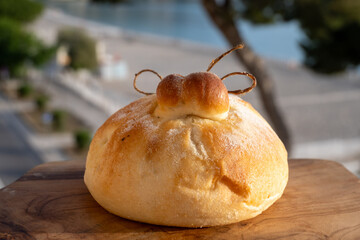 Fresh baked bread in burrata cheese shape filled with tomatoes, vegetables, parmaham and cheese,...