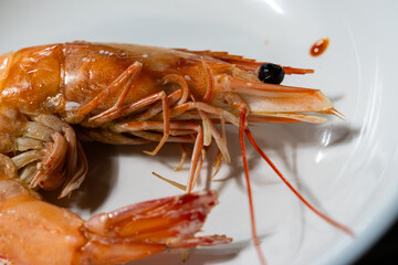 a roasted prawn on a dish