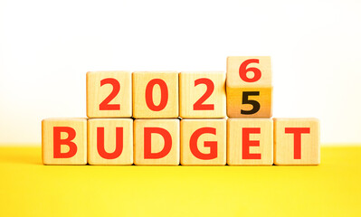 2026 Budget symbol. Concept words 2026 Budget on beautiful wooden blocks. Beautiful white and yellow paper background. Business and 2026 budget concept. Copy space.