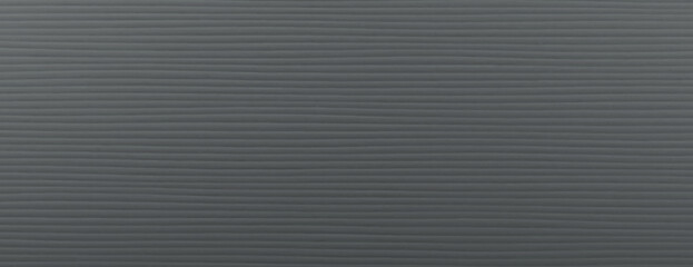 Obraz premium Gray background, background with subtle ribbed texture, background in gray color, offering a minimalist and modern style. Minimal line paper texture. Simple paper background vector