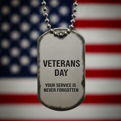 Service Never Forgotten close-up military dog tag honoring Veterans Day against a soft-focus US flag.