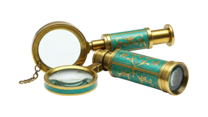 Ornate brass magnifying glass and telescope on black background.
