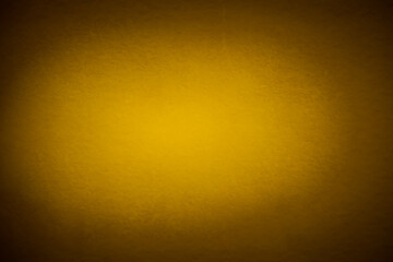 a textured, warm golden-yellow background with a subtle gradient from darker yellow at the edges to lighter yellow at the center