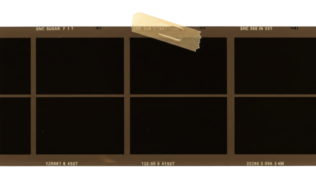 Exposed  strip with blank frames and tape holds it together.