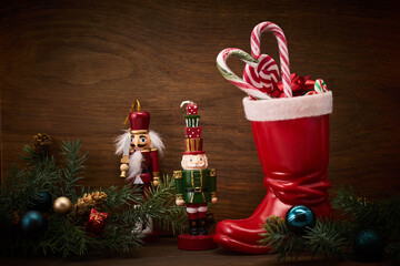 St. Nicholas Day. Red boot with sweets, spicy ginger cookies and gifts for December 6th