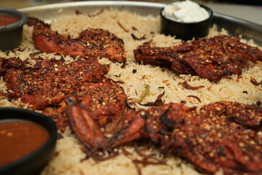Arabian chicken Manthi or mandi cooked meat, Basmati rice with Masala, spice. Kuzhimanthi or hot and spicy Manthi in South India