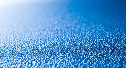 Obraz premium Abstract blue background with small bubbles and light