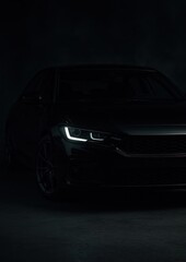 Obraz premium Sleek car with illuminated headlights.