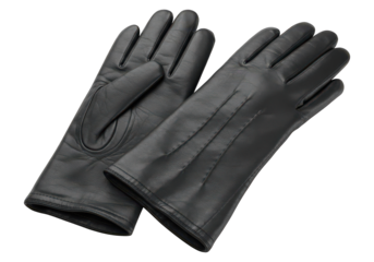 Black leather gloves lie on a dark background.