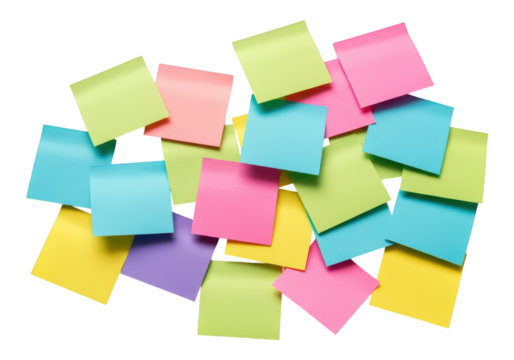 Pile of colorful sticky notes scattered on a white background.
