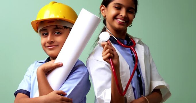 Indian School Kids Posing as a Doctor and Engineer in Classroom While Wearing School Uniforms, Lab Coat, Hard Hat, Stethoscope, Participating in Career Role Play Activity During Educational Session