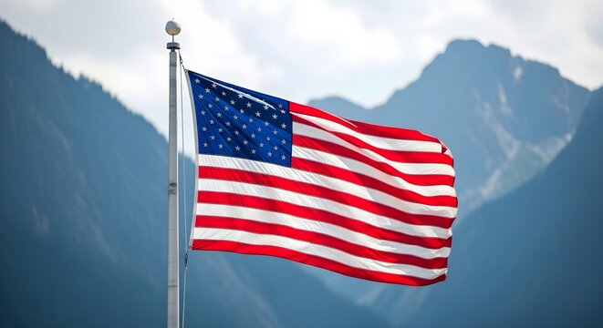 The American Flag Waving Proudly with Alaskan Mountains