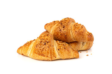 Delicious croissant with nut crumbs, sweet French bakery