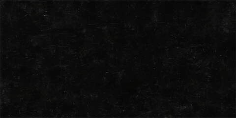 Aged, rough black and white grunge wall texture forms a dark vintage backdrop or blank paper surface for design