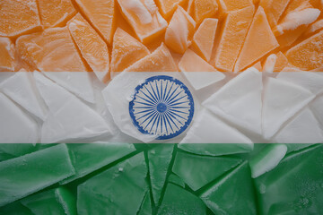 Origami flag with orange, white, green, and blue sections, representing a nation's identity and heritage.