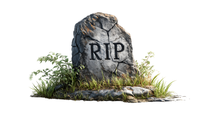 Ancient cracked tombstone with carved r.i.p. surrounded by grass