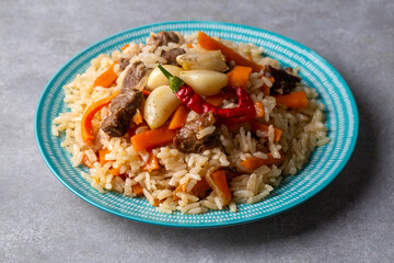Homemade Uzbek pilaf or plov