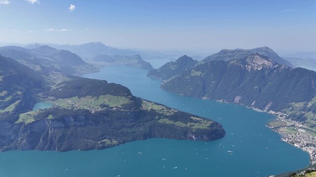 Panoramic view from Fronalpstock mountain in Switzerland with Swiss Alps and lakes